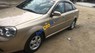 Daewoo Lacetti 2005 - Cần bán Daewoo Lacetti đời 2005, màu vàng, giá cạnh tranh