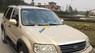 Ford Escape 2.3AT 2004 - Cần bán xe Ford Escape 2.3AT đời 2004, màu vàng còn mới