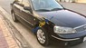 Ford Laser   1.8 GHIA  2004 - Gia đình bán Ford Laser 1.8 GHIA đời 2004, màu đen