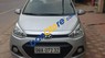 Hyundai Grand i10 2015 - Bán Hyundai Grand i10 năm sản xuất 2015, màu bạc, giá 310tr