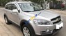 Chevrolet Captiva    LT 2009 - Chính chủ bán Chevrolet Captiva LT sản xuất 2009, màu bạc, nhập khẩu