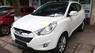 Hyundai Tucson 2.0 AT 4WD 2011 - Bán Hyundai Tucson 2.0 AT 4WD 2011, màu trắng, xe nhập