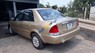 Ford Laser Delu 1.6 MT 2002 - Bán ô tô Ford Laser Delu 1.6 MT sản xuất năm 2002, màu vàng