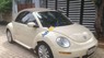 Volkswagen New Beetle 2.5 AT 2008 - Bán Volkswagen New Beetle 2.5 AT đời 2008, màu kem (be), xe nhập