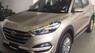 Hyundai Tucson 2018 - Cần bán Hyundai Tucson năm 2018 màu vàng, 828 triệu