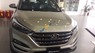 Hyundai Tucson 2018 - Cần bán Hyundai Tucson năm 2018 màu vàng, 828 triệu