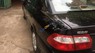 Mazda 626 1.8 MT 2000 - Bán ô tô Mazda 626 1.8 MT năm 2000, màu đen