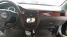 Daewoo Lacetti 2010 - Cần bán xe Daewoo Lacetti 2010, màu đen. Gía 215tr