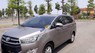 Toyota Innova 2.0E 2017 - Cần bán lại xe Toyota Innova 2.0E sản xuất năm 2017, màu xám