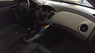 Chevrolet Cruze LT 1.6MT 2015 - Bán xe Chevrolet Cruze LT 1.6MT năm 2015, màu đen số sàn, 450tr