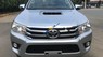 Toyota Hilux 2.4E MT 2015 - Cần bán gấp Toyota Hilux 2.4E MT năm 2015, màu bạc, nhập khẩu nguyên chiếc giá cạnh tranh