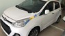 Hyundai Grand i10  MT 2014 - Cần bán gấp Hyundai Grand i10 MT sản xuất 2014, màu trắng, giá tốt