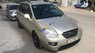 Kia Carens 2009 - Cần bán Kia Carens năm 2009, màu vàng, giá 305tr