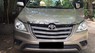 Toyota Innova E 2016 - Bán Toyota Innova E đời 2016, màu vàng, số sàn