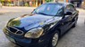 Daewoo Nubira 1.6 2001 - Cần bán gấp Daewoo Nubira 1.6 đời 2001 đen