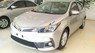 Toyota Corolla altis 1.8E CVT 2018 - Bán ô tô Toyota Corolla altis 1.8E CVT sản xuất năm 2018, màu bạc, 707 triệu