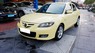 Mazda 3 AT 2005 - Cần bán lại xe Mazda 3 AT năm sản xuất 2005, màu vàng số tự động, giá 268tr
