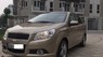 Chevrolet Aveo 1.5MT 2014 - Cần bán xe Chevrolet Aveo 1.5MT 2014, màu vàng cát, biển Hà Nội