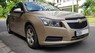 Chevrolet Cruze 1.6 MT   2011 - Cần bán gấp Chevrolet Cruze 1.6 MT đời 2011, màu ghi vàng