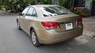 Chevrolet Cruze 1.6 MT   2011 - Cần bán gấp Chevrolet Cruze 1.6 MT đời 2011, màu ghi vàng