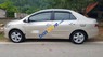 Toyota Vios   E 2010 - Cần bán gấp Toyota Vios E sản xuất 2010, màu vàng