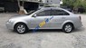 Daewoo Lacetti EX 2010 - Gia đình bán Daewoo Lacetti EX năm sản xuất 2010, màu bạc. Xe nguyên bản 100%