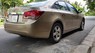 Chevrolet Cruze 1.6 MT   2011 - Cần bán gấp Chevrolet Cruze 1.6 MT đời 2011, màu ghi vàng