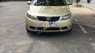 Kia Forte MT 2010 - Bán Kia Forte MT sản xuất năm 2010, màu vàng 