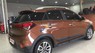 Hyundai i20 Active 1.4AT 2015 - Cần bán xe Hyundai i20 Active 1.4AT đời 2015, màu nâu, xe nhập