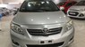 Toyota Corolla altis   2010 - Cần bán gấp Toyota Corolla Altis đời 2010, màu bạc