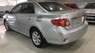 Toyota Corolla altis   2010 - Cần bán gấp Toyota Corolla Altis đời 2010, màu bạc