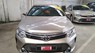 Toyota Camry 2.0E 2015 - Cần bán Toyota Camry 2.0E 2015, màu vàng đồng, mới đi 14.000km, xe cũ giá tốt nhất