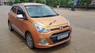 Hyundai Grand i10 2014 - Bán Hyundai Grand i10 đời 2014, màu nâu, xe đẹp