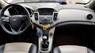 Chevrolet Cruze 1.6MT 2015 - Gia đình bán ô tô Chevrolet Cruze 1.6MT đời 2015, màu trắng, đi kĩ còn rất đẹp