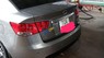 Kia Forte 2011 - Gia đình có việc cần bán xe Kia Forte 2011, màu xám, số sàn