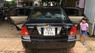 Ford Laser Ghia AT 2004 - Cần bán Ford Laser Ghia AT năm 2004, màu đen xe gia đình