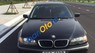 BMW 3 Series 318i 2002 - Cần bán lại xe BMW 3 Series 318i năm 2002, màu đen, xe nhập