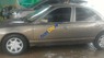 Ford Contour SE 1996 - Bán Ford Contour SE năm 1996, màu vàng, xe nhập, giá 100tr