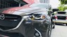 Mazda 2 1.5AT 2016 - Cần bán gấp Mazda 2 1.5AT sản xuất năm 2016, màu đen  