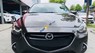 Mazda 2 1.5AT 2016 - Cần bán gấp Mazda 2 1.5AT sản xuất năm 2016, màu đen  