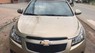 Chevrolet Cruze   2011 - Đổi xe mới, cần bán Cruze 2011, số sàn, màu vàng cát