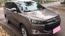 Toyota Innova E MT 2017 - Cần tiền bán gấp Innova MT 2017 nâu đất xe như mới. Xe mới mua