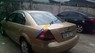 Ford Mondeo 2004 - Cần bán lại xe Ford Mondeo năm 2004, màu vàng 