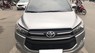 Toyota Innova E 2018 - Gia đình cần bán Innova 5/2018, số sàn, màu xám bạc