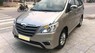 Toyota Innova E 2014 - Bán Toyota Innova E sản xuất 2014, màu vàng