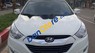 Hyundai Tucson   2011 - Cần bán Hyundai Tucson năm 2011, màu trắng, 565 triệu