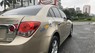 Chevrolet Cruze LS 2010 - Bán Chevrolet Cruze LS sản xuất năm 2010, màu vàng, giá 310tr