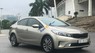 Kia Cerato 2.0AT 2016 - Bán Kia Cerato 2.0AT sản xuất năm 2016, màu vàng cát