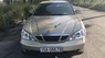 Daewoo Magnus 2004 - Cần bán lại xe Daewoo Magnus sản xuất 2004, màu vàng, giá tốt