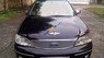 Ford Laser GHIA 2004 - Cần bán xe Ford Laser Ghia sản xuất 2004, màu đen chính chủ